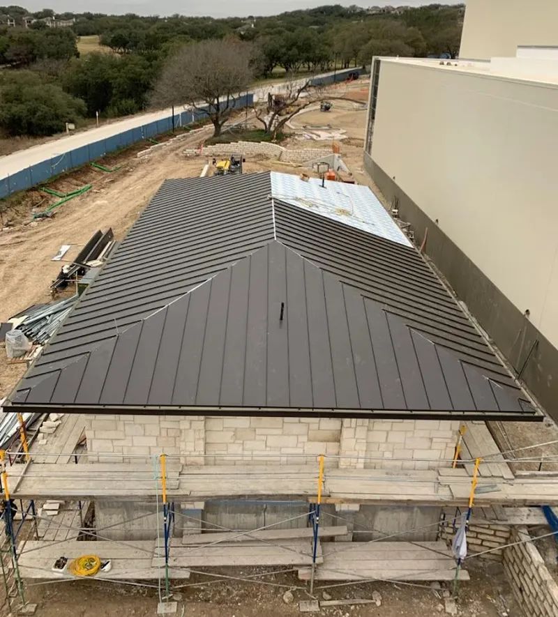Metal roof new construction with scaffolding in Ashland